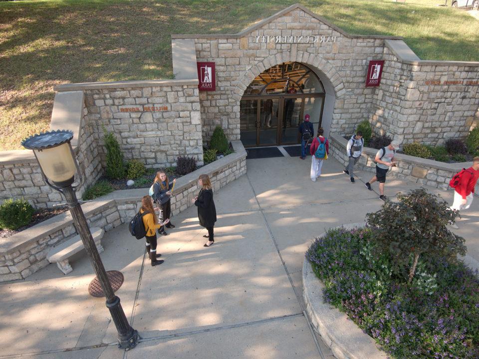 students around Park arch